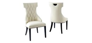 Tremiti Pair Of Cream Leather Quilted Dining Chairs With Black Lacquer Legs And Details